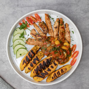 Grilled Plantain + Chicken & Veg Sauce — ~450 kcal | Energy Boost